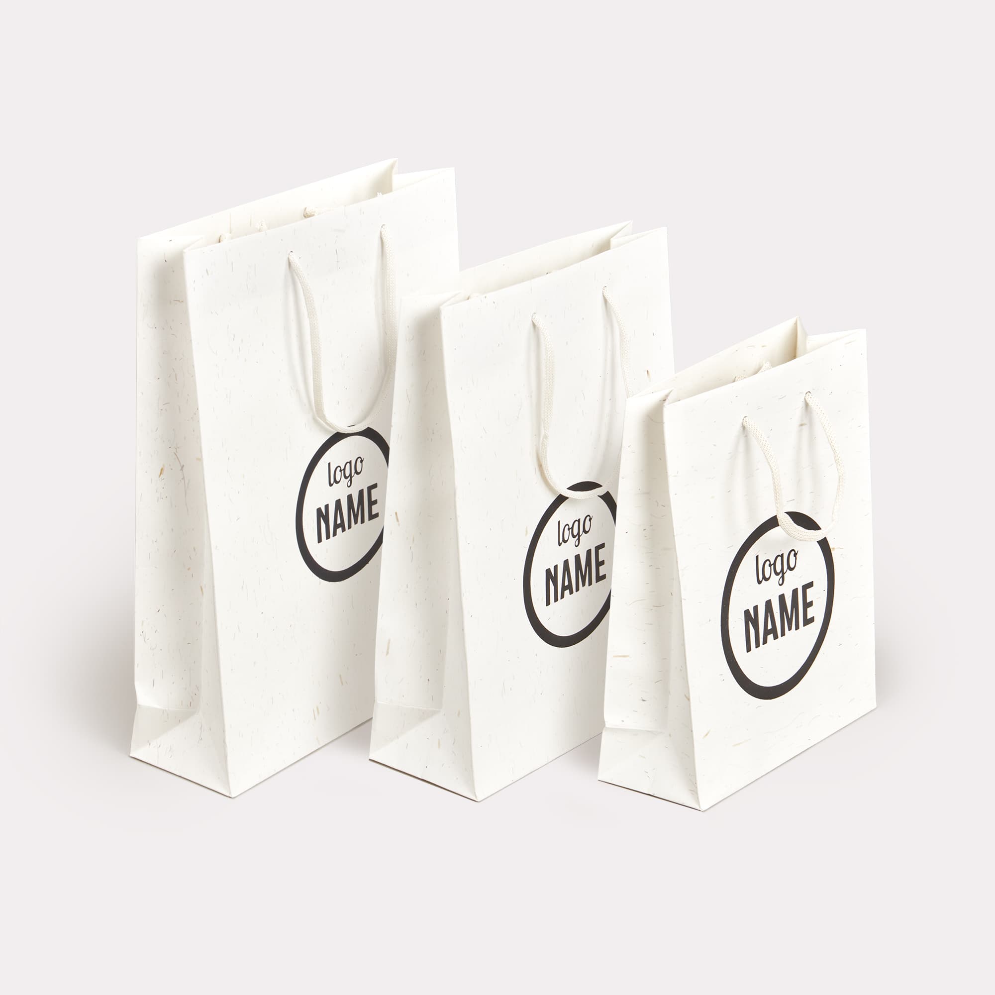Sacs luxe en papier recyclé avec poignées en fibres de paille